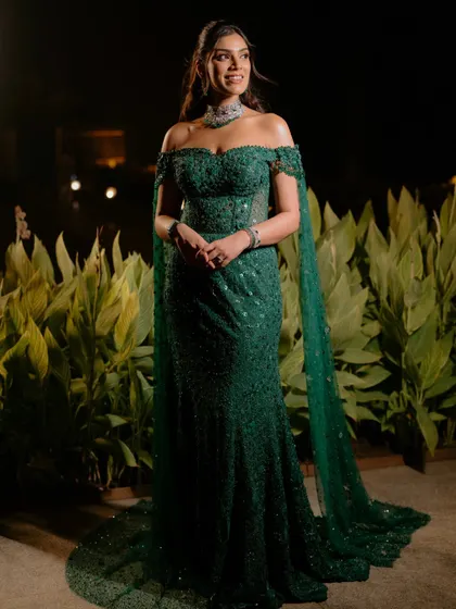 The complete reception ensemble. The soft, timeless makeup provides the perfect balance to the intricate details of her Tarun Tahiliani gown, creating a look of pure elegance for her special night.