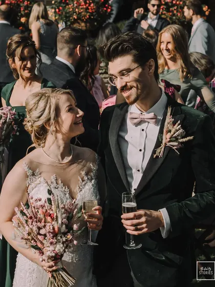 A beautiful close-up of the bride and groom looking at each other, a stolen glance filled with love and happiness.