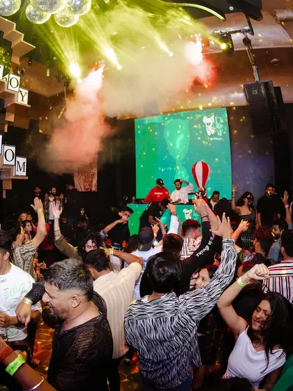 The crowd goes wild at Toy Room, with CO2 smoke filling the air. These are the high-impact moments that define my sets.