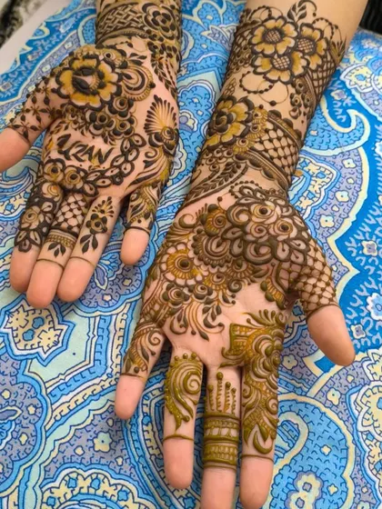 A duplicate of ID 55, offering another clear look at this personalized and intricate mehendi.