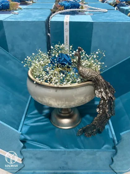 The complete presentation of the blue-themed Peacock Bowl hamper. The custom box, ribbon, and the bowl itself come together to create a cohesive and luxurious gifting experience.