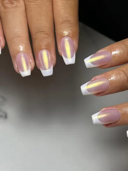 A close-up of the glazed chrome French tip. Notice the smooth application and the way the chrome powder creates a liquid-like shine over the nail.