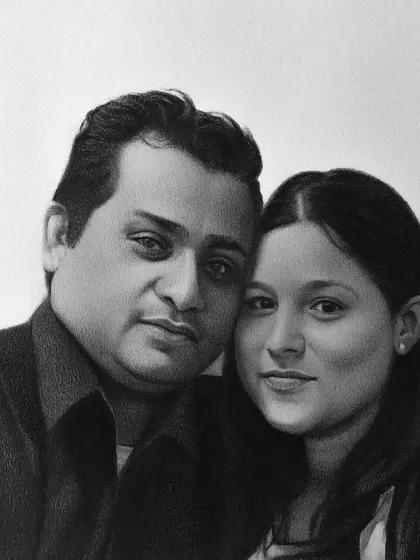 A commissioned couple portrait that captures a quiet, intimate moment between two people.