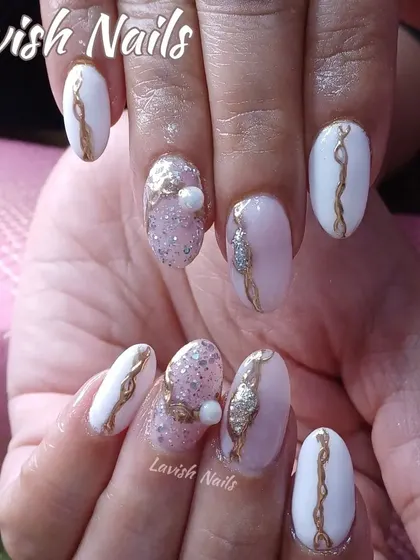 An elegant white and pink set with gold line art, glitter, and pearl embellishments for a luxurious and detailed finish.