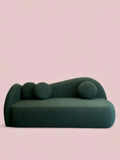 This is my 'Baymax Cloud Sofa' in a rich viridian green. Its unique, asymmetrical form and cloud-like comfort make it the perfect epic nap spot for a bedroom or study.