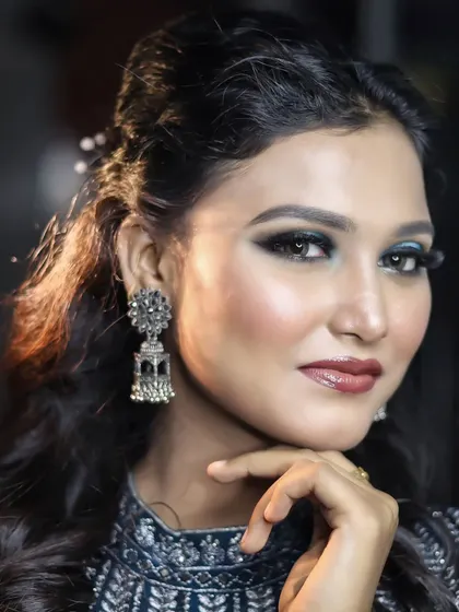 Another angle of this glamorous party look, highlighting the flawless base and contoured cheeks.