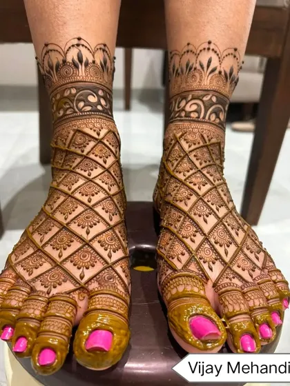 A full-coverage foot design with an intricate jaali (net) pattern, perfect for brides who want a very detailed look.