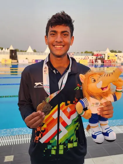 Vedanta Venkata Madhira with his gold medal in the 200m Backstroke.