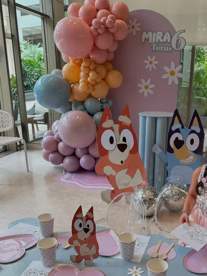 A view of the Bluey backdrop from the kids' activity table, showing how the theme was integrated into every part of the celebration.