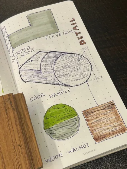 A sketch from a notebook, detailing a custom door handle. This is where many of our ideas begin, as we think through the small details that give a space its unique identity.