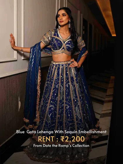 A stunning blue gota lehenga with sequin embellishments, available for an incredibly affordable rental price.
