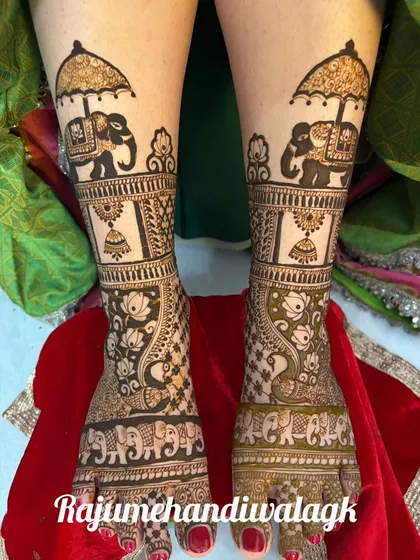 A royal foot design with elephants under umbrellas, jhumkis, and lotus motifs.