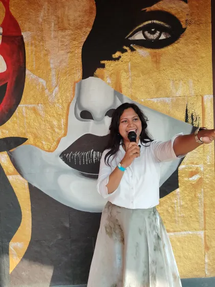 Hosting a birthday party against a cool artistic backdrop. I always find a way to interact with the crowd and bring my energy to every corner of the venue.