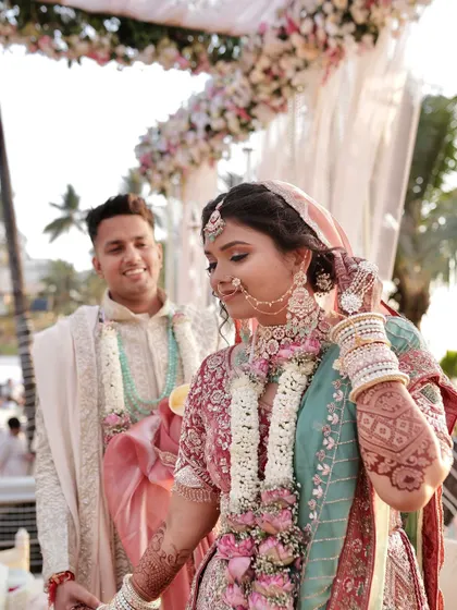 Another beautiful shot of my beach bride. Her makeup is dewy and fresh, with a focus on enhancing her natural glow.