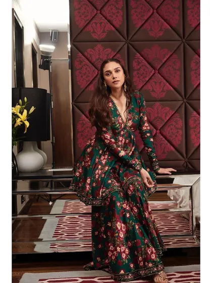 The full look of the Prints by Radhika floral set. The peplum top gives it a modern structure, while the flowing pants keep it graceful.