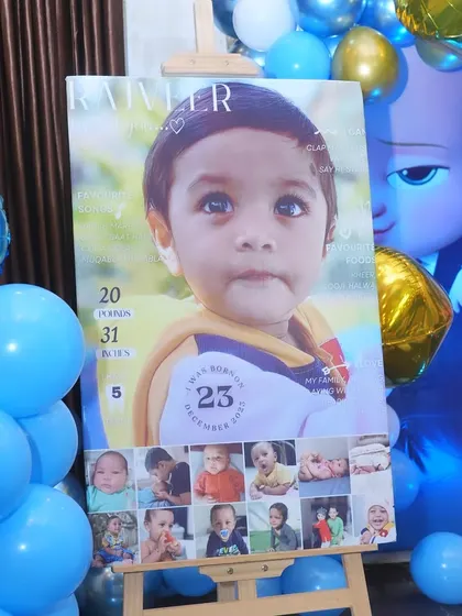 A personalized milestone board for Rajveer's first birthday. It highlights his birth details and cute habits, making it a wonderful keepsake for the parents.
