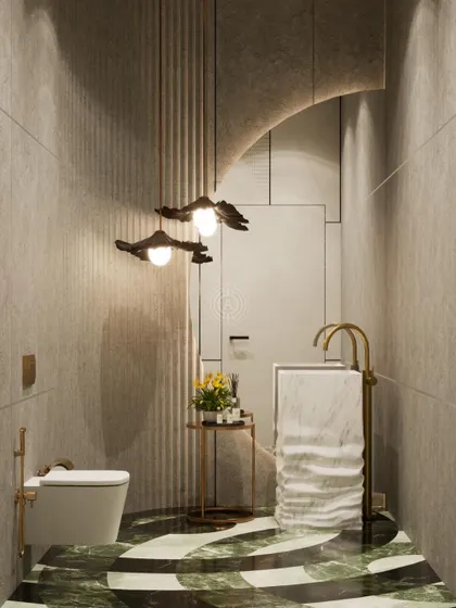 The powder room for the Kolkata den, rendered with a stunning green and white patterned marble floor and a custom-carved pedestal sink, proving that even small spaces can make a big impact.