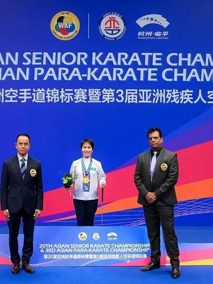 Awarding a medal at the 3rd Asian Para-Karate Championship in Hangzhou, China. Promoting para-karate is a key priority for me and the KIO.