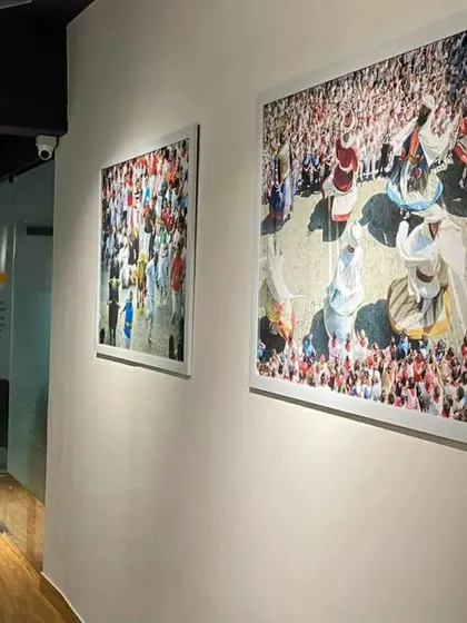 We used colorful and engaging artwork to add personality to the common areas of this co-working space. The large, framed prints create visual interest along the corridors and break up the monotony of the white walls.