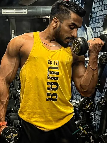 The pump from a good bicep curl session. The vascularity and muscle fullness seen here are the immediate results of an intense workout, fueling motivation for the next one.