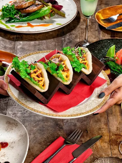 Indulge in a taste of the Mediterranean with our Cottage Cheese and Sun-Dried Tomatoes Open Bao. It's a delightful union of creamy and tangy in a fluffy embrace.