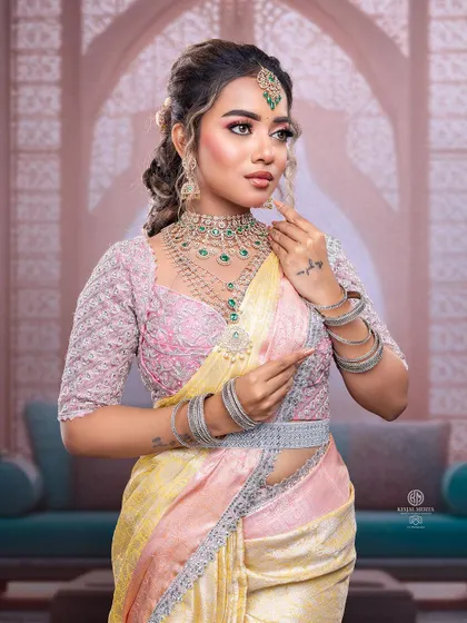 A professional shot from a masterclass, where the model's hair is styled in a modern, textured open look with curls. This style is part of the curriculum I teach for reception looks.