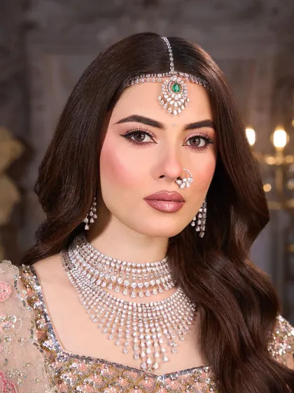 A detailed close up of the eye makeup and flawless skin. This is a perfect example of a soft glam look that is both timeless and modern.