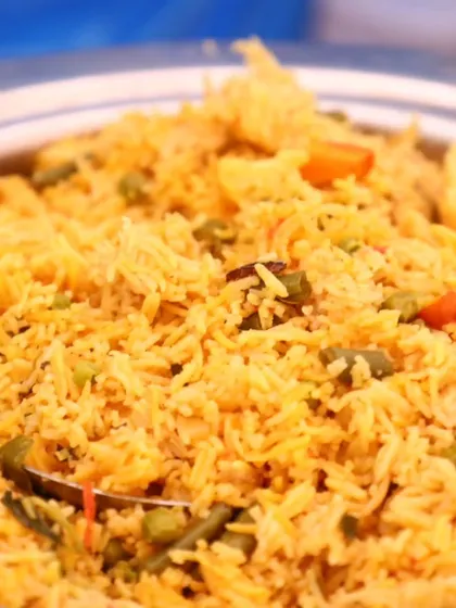 Fragrant and colorful vegetable pulao, cooked with long-grain basmati rice and fresh vegetables, a popular main course for all events.