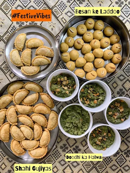 A festive spread of Indian sweets including Shahi Gujiyas, Besan ke Laddoo, and Doodhi ka Halwa.