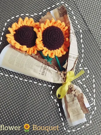 A beautiful handmade sunflower bouquet, perfect for gifting. Each sunflower is crafted with detailed petals and a textured center.