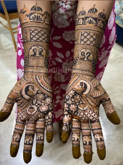This is the kind of stunning, professional-level work my students can create after completing the course. This full-hand bridal design features detailed palace architecture, peacock motifs, and tiny elephants, showcasing advanced finishing techniques.