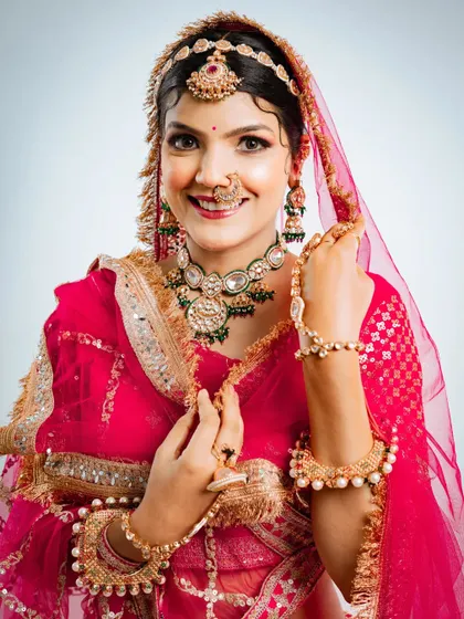 A beautiful portrait showcasing the stunning bridal makeup and jewellery that complete the Marvadi look.