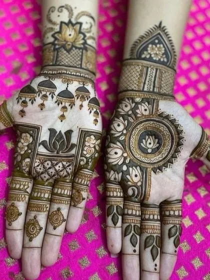 A duplicate of image 12, showcasing a beautiful design with a central mandala and hanging 'jhumki' motifs, both featuring the elegant lotus flower.