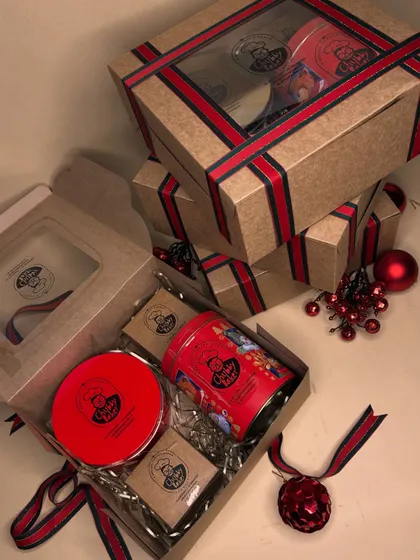 Our Ultimate Christmas Hamper, all boxed up and ready for gifting. I make sure the packaging is as special as the treats inside, with festive ribbons and a clear window to peek at the goodies.