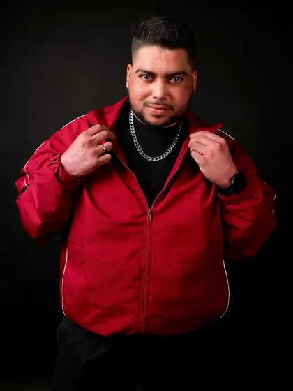 A confident look from my professional photoshoot. I present myself with the same quality and care that I put into my music.