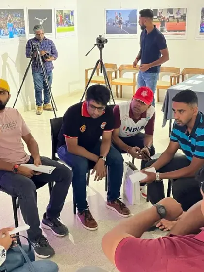 A group of sports professionals engage in a discussion at the networking event. We are proud to play our part in creating a vibrant platform where different facets of Indian sports can unite.