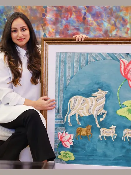 Holding a completed piece from the Nandi Collection. Each one is very close to my heart, a direct link to my heritage and faith, brought to life through contemporary embroidery.