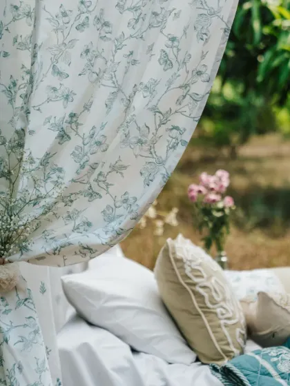 Where sunlight dances and curtains flutter. This close-up shows our floral sheer curtain tied back, creating a soft, romantic look that captures the essence of a peaceful, nature-inspired home.