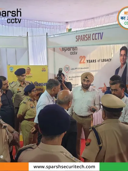 A large group of UP Police personnel gathered at my booth, keen to learn about my latest innovations in security technology.