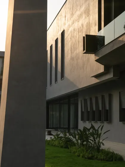 Various exterior perspectives that capture the dynamic geometry and the dance of light and shadow across the concrete surfaces throughout the day.