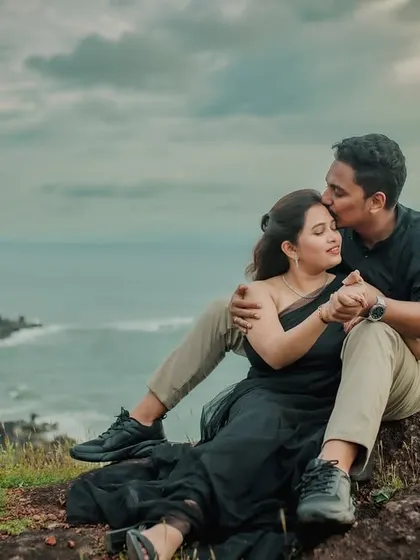 Using nature's drama to highlight a couple's connection is one of my favorite things to do. This pre-wedding photo, taken on a cliff overlooking the Kokan coast, captures a powerful and romantic moment against an incredible landscape.