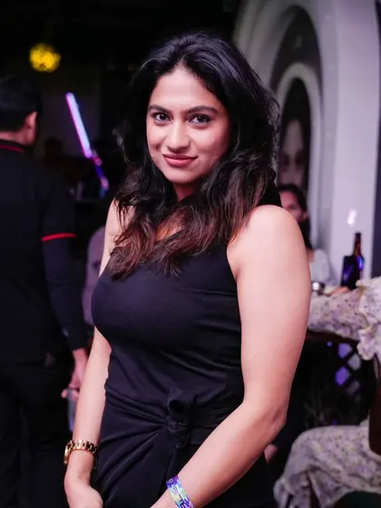 A guest looking elegant and enjoying the sophisticated vibe of the club. I can tailor my music to fit any atmosphere.