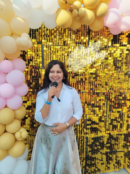 Sharing a laugh with the audience. My style is all about being relatable and fun, which helps break the ice and encourages guests to participate.