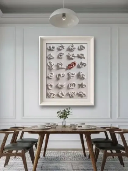 My 'KNOTS' artwork, seen here in a client's dining room, uses 3D knots to symbolize personal challenges. The single colored knot represents the one issue we are actively working to untangle, showing that growth is a gradual process of self-improvement.