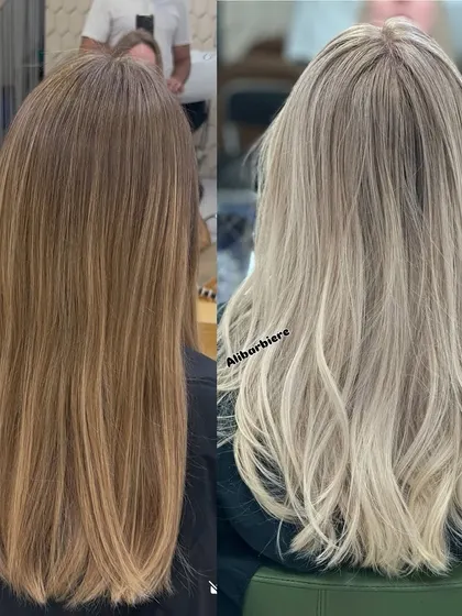 A perfect example of going from a warm, faded blonde to a pure, clean, and cool-toned blonde. This side-by-side shows the power of proper toning and highlighting to create a completely new and refreshed look, finished with soft waves to show off the dimension.
