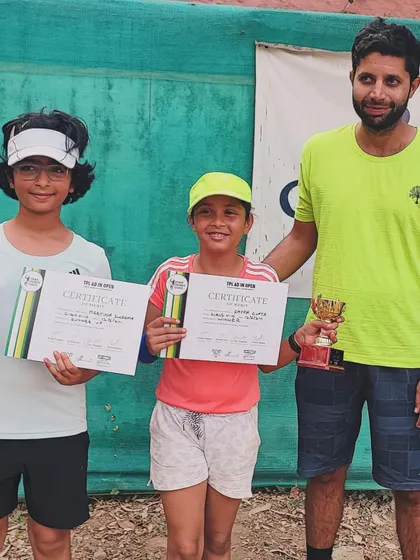 A coach with his two winning students. We are proud of their progress and achievements.
