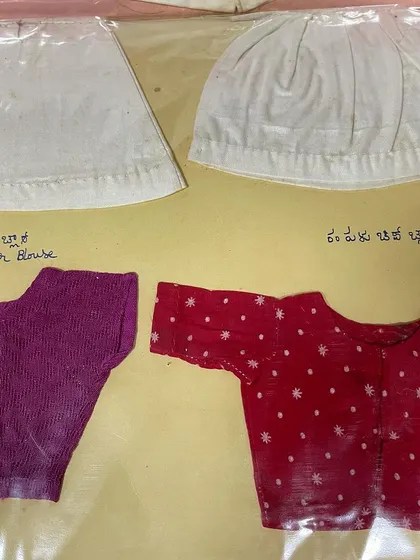 Miniature blouses and other garments from my mother's tailoring journal. Her dedication to her craft has guided me throughout my career.