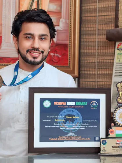 My collection of awards and certificates, including a medal and certificate from the Vishwa Guru Bharat National Conference. All of this is due to the mercy of my Thakur Ji and my Maa.