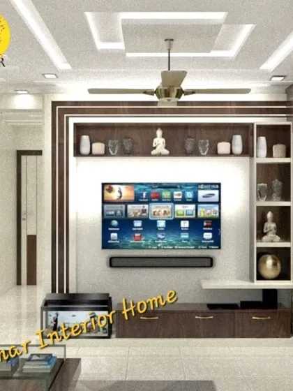 A complete living room setup with a custom-built, wall-to-wall entertainment unit. The design incorporates open shelves for display, closed cabinets for storage, and a dedicated space for an aquarium.