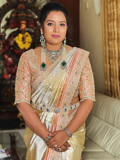 This look is all about regal elegance. The multi-toned saree and statement jewelry are balanced with sophisticated makeup, a skill you will learn to master.